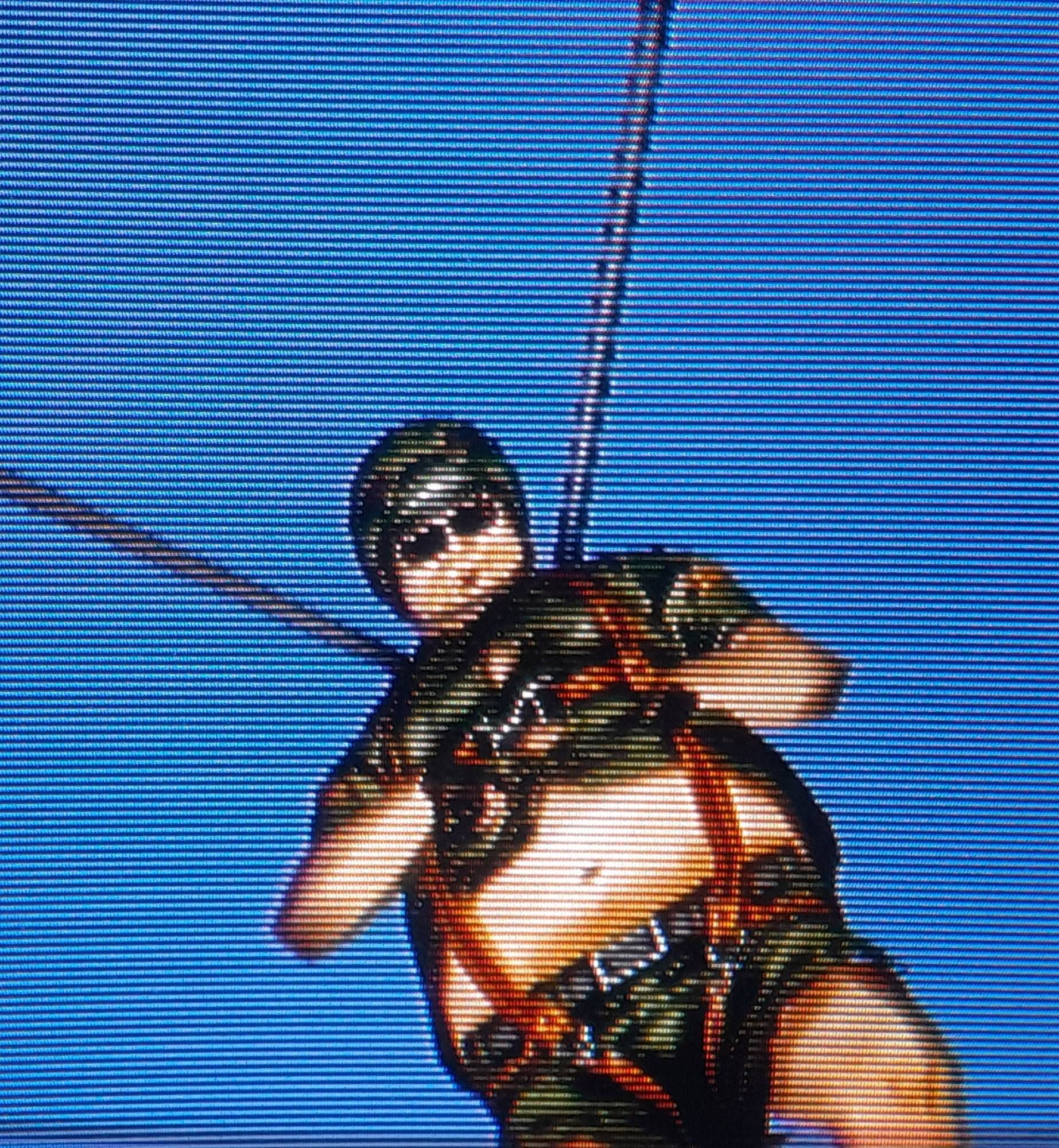 A character named "Pizza Fat" parachuting from his downed plane