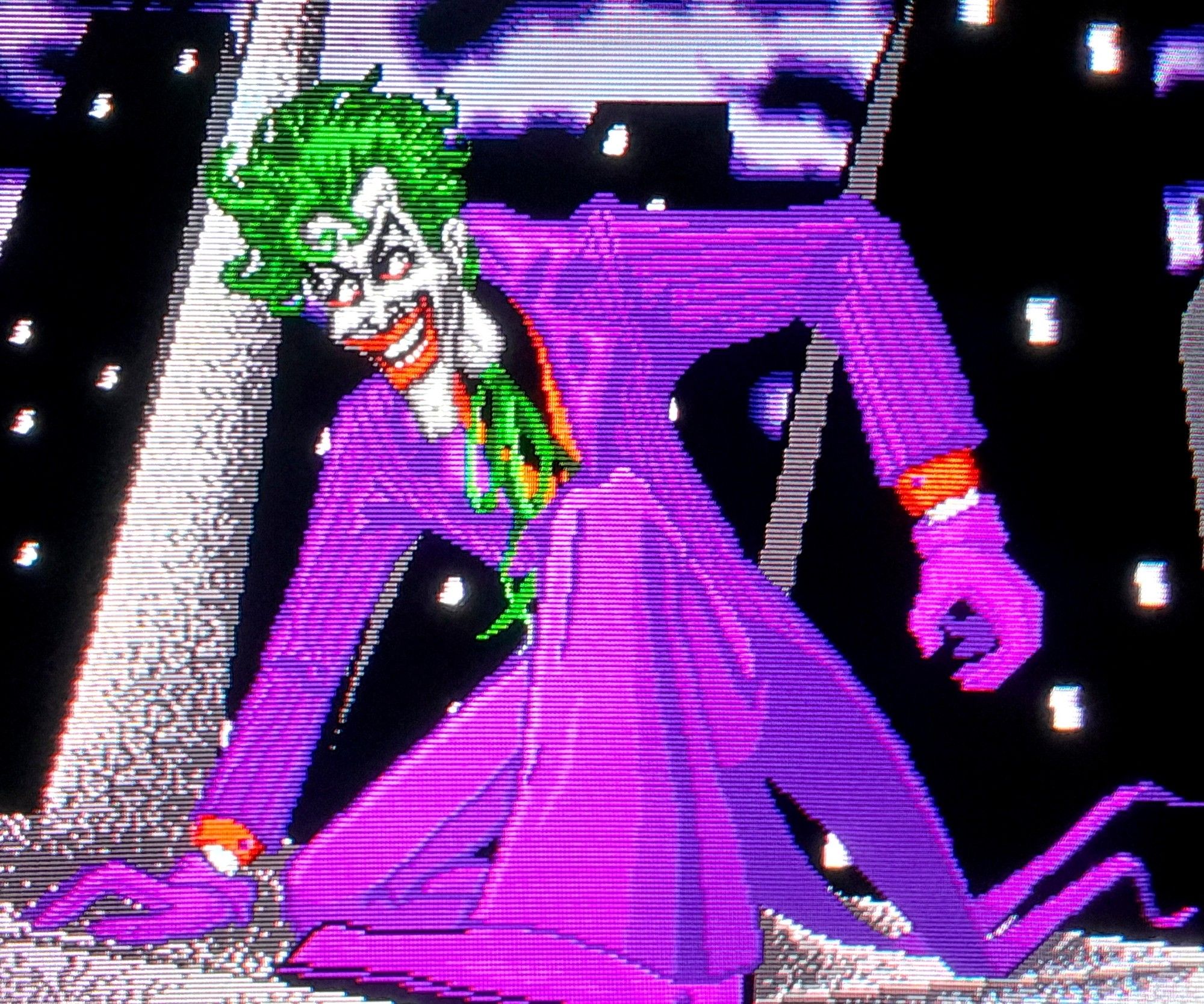 The purple suit clad green haired Joker, posing as if he's in a Skechers ad