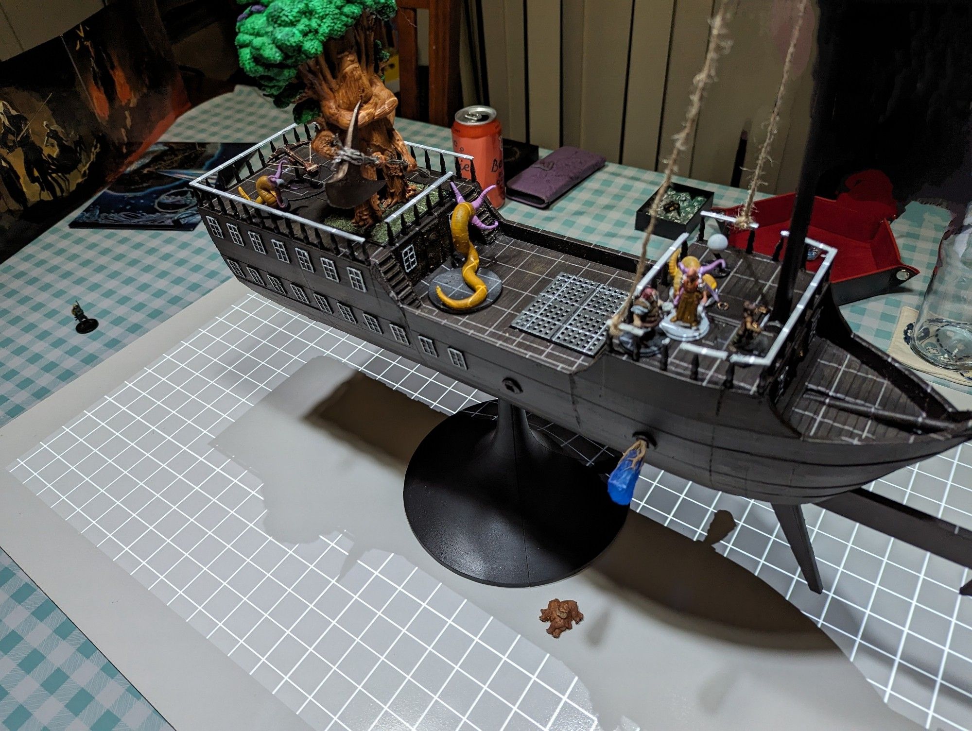 A 3d printed ship with D&D minis fighting a group gricks on board