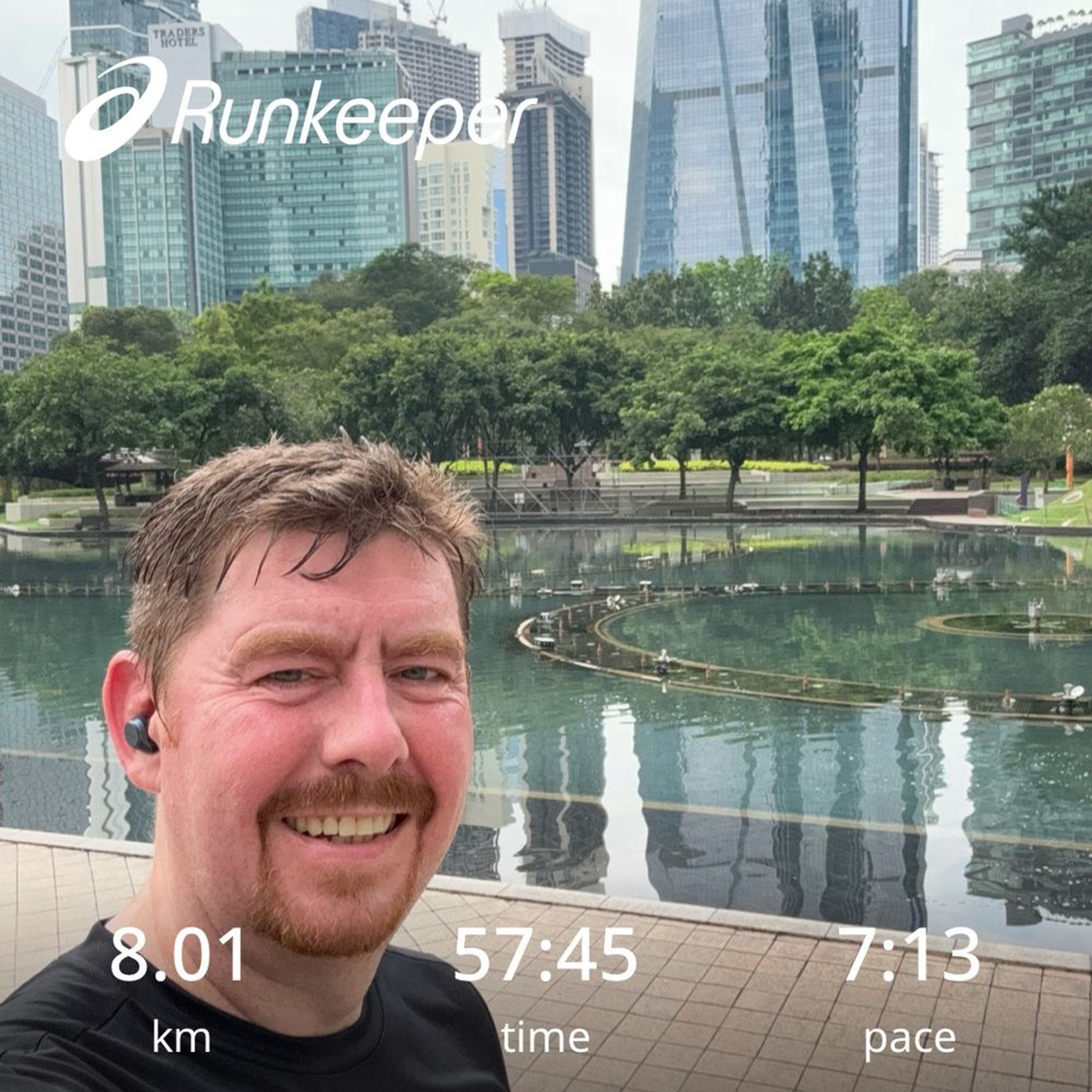 Me at the lake at KLCC with my time: 8:01k in 57:45