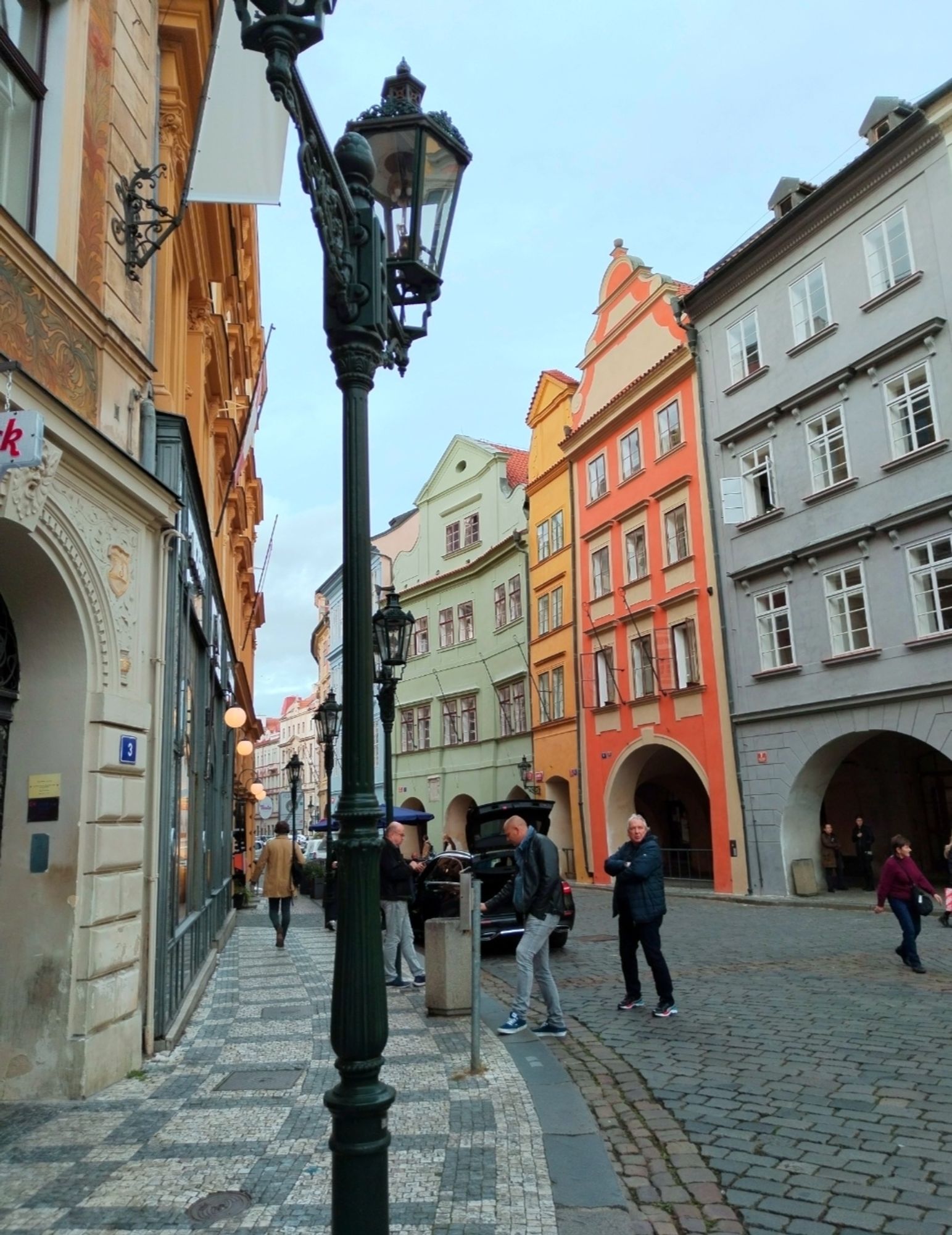 A street in Prague with pretty colourful buildings