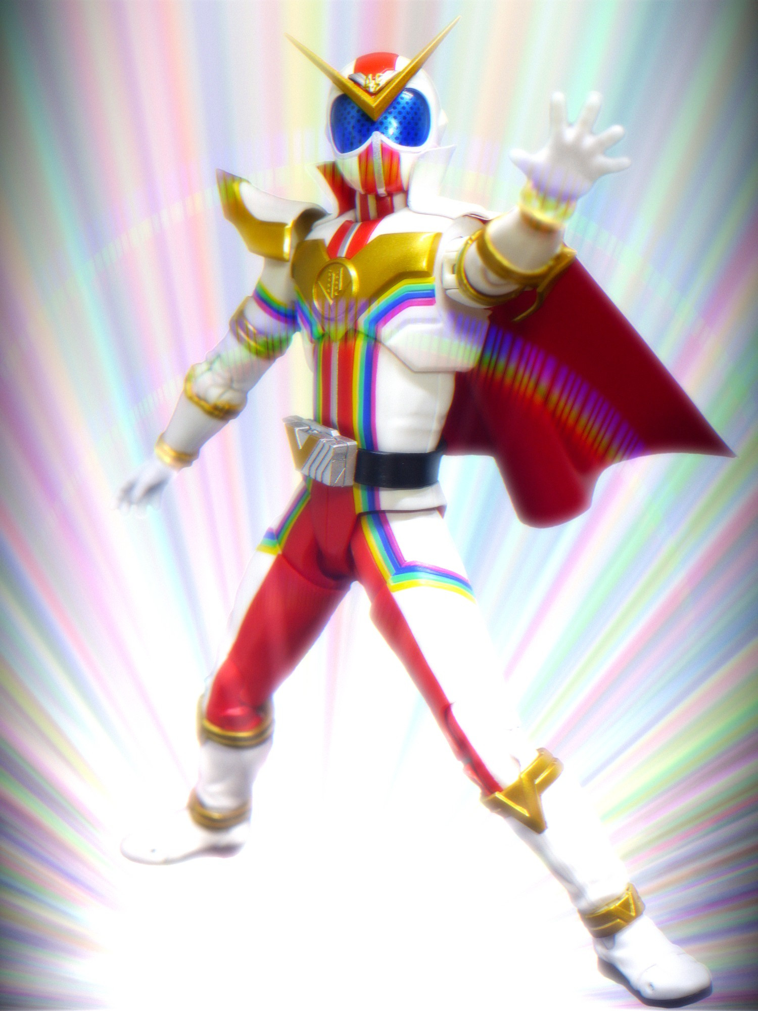 Photo of an action figure, an armored superhero with a colorful costume and cape.