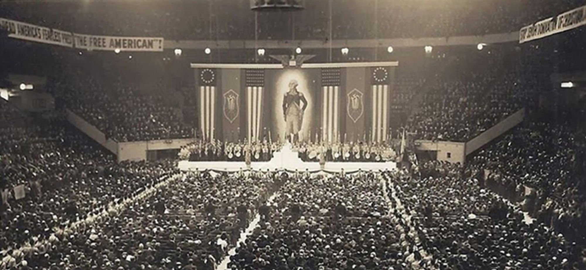 February 20, 1939: a “Pro-American Rally.”  The organizers had chosen the date in celebration of George Washington’s birthday and procured a 30-foot-tall banner of America’s first president for the stage. 20,000 men and women streamed inside and took their seats. The view they had was stunning: Washington was hung between American flags…and swastikas.