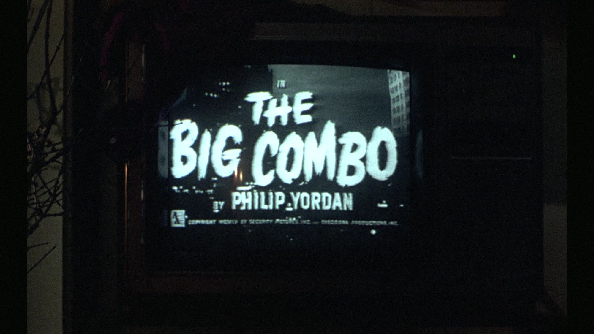 The Big Combo (1955) plays on a CRT TV in an abandoned house.