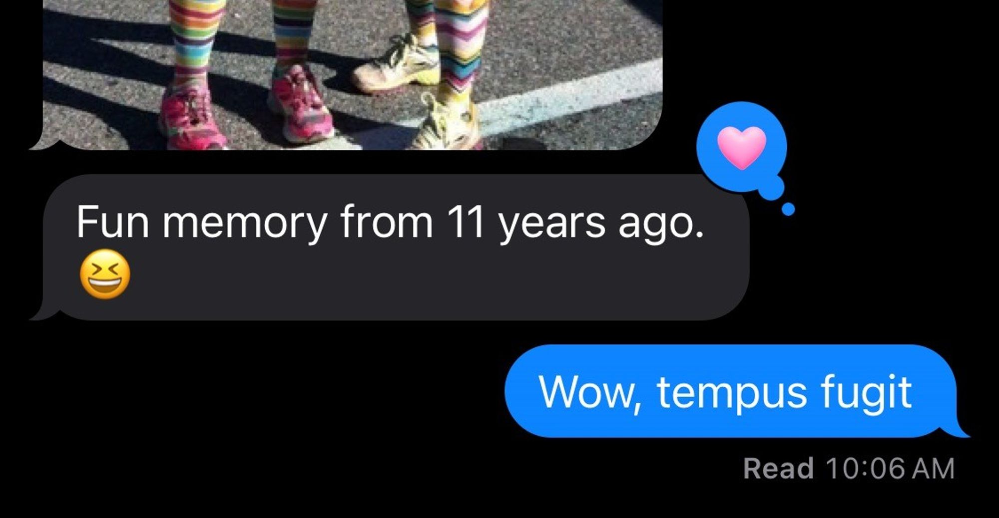 Screen shot from Messages app showing bottom of picture in upper left showing two people’s feet and running showed, text below picture reads

Fun memory from 11 years ago

Blue reply text reads 

Wow, tempus fugit 