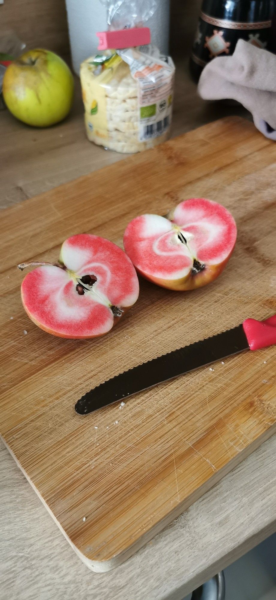 Baya Marisa apples cut in half.