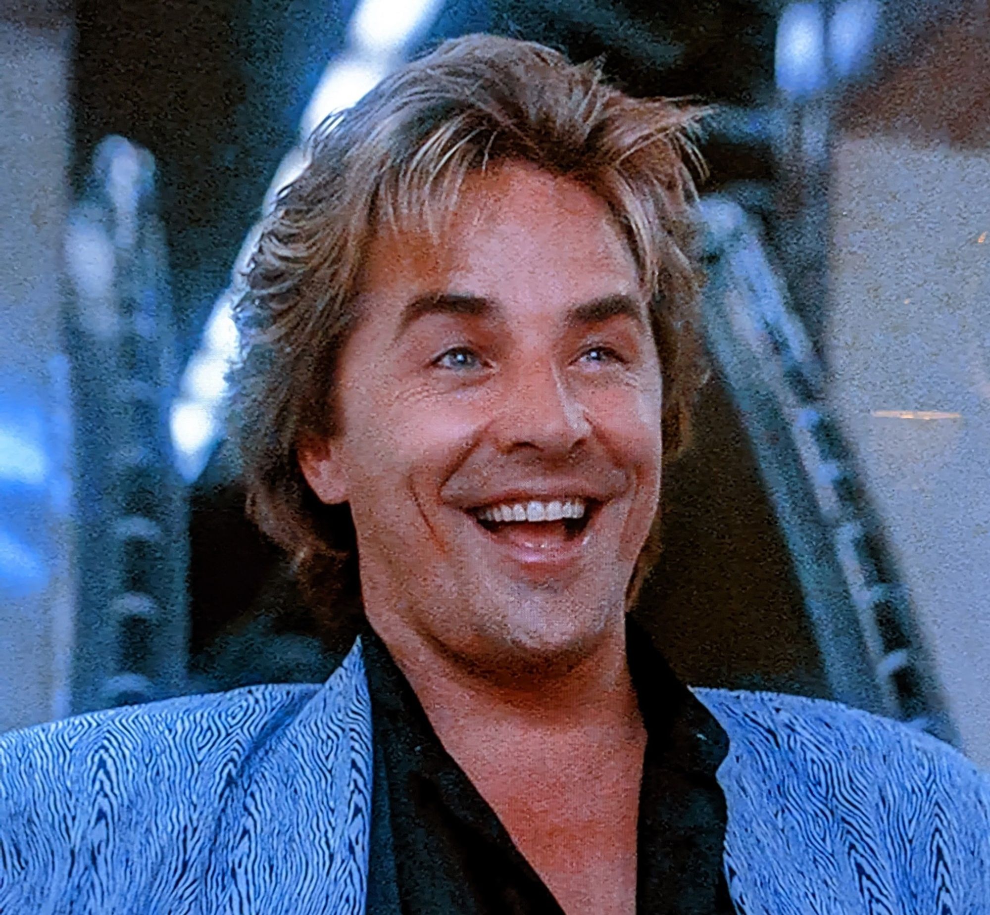 Sonny Crockett laughing.