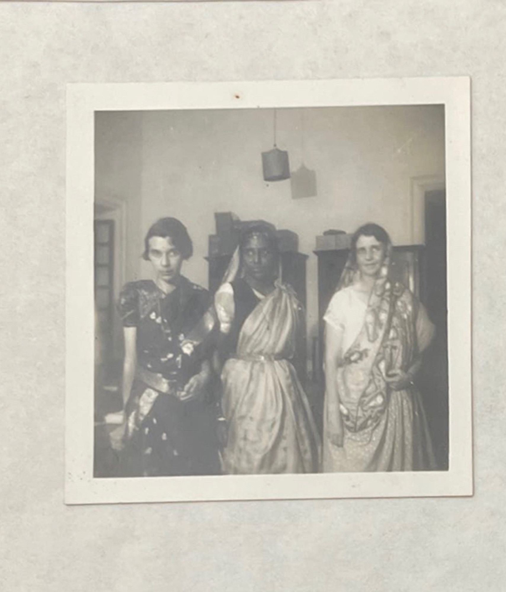 three women in saris - black and white photo from the 1930s