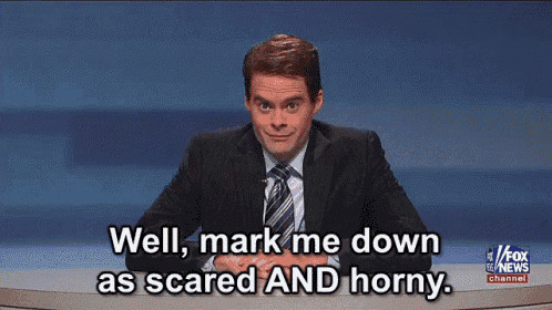 Comedian Bill Hader (a tall white man in his 30s) doing a sketch where he's an anchorman at a news desk. He is saying, "Well, mark me down as scared AND horny")
