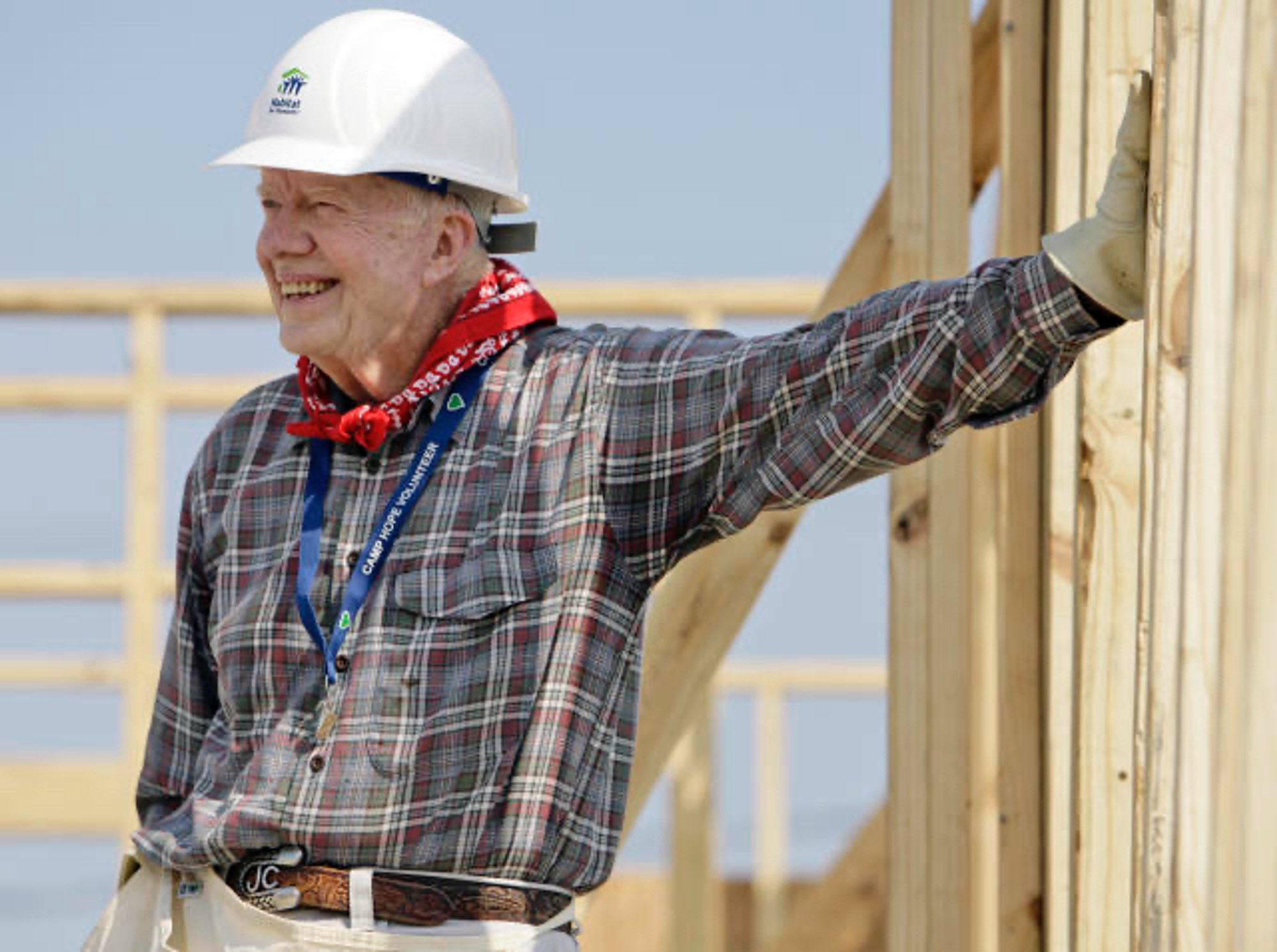 Carter building a Habitat for Humanity house