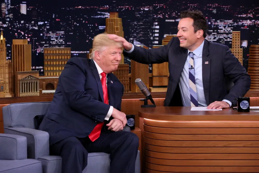 Jimmy Fallon tousling Trump's hair