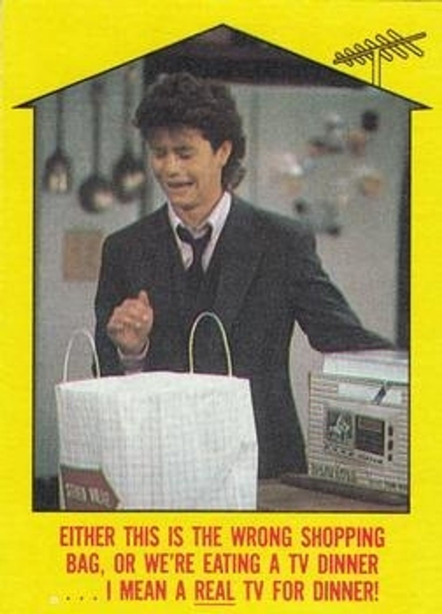 Card front: still of Kirk Cameron looking at the contents of a shopping bag, with the caption "Either this is the wrong shopping bag, or we're eating a TV dinner...I mean a REAL TV dinner!"