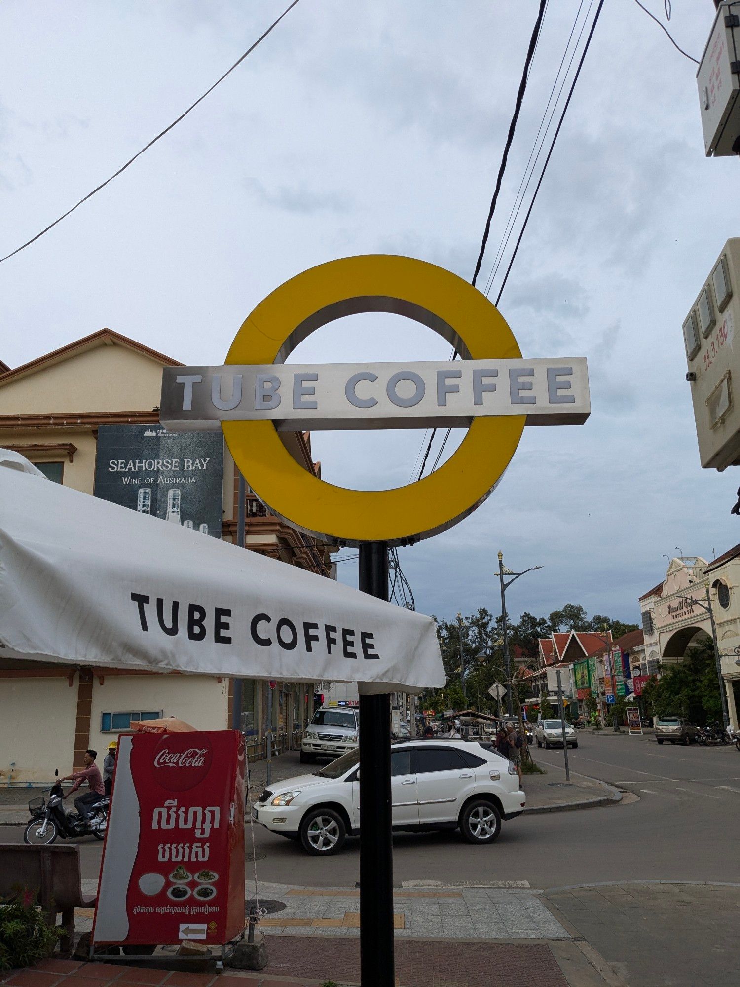 A coffee shop called "Tube Coffee" branded with the TFL roundel