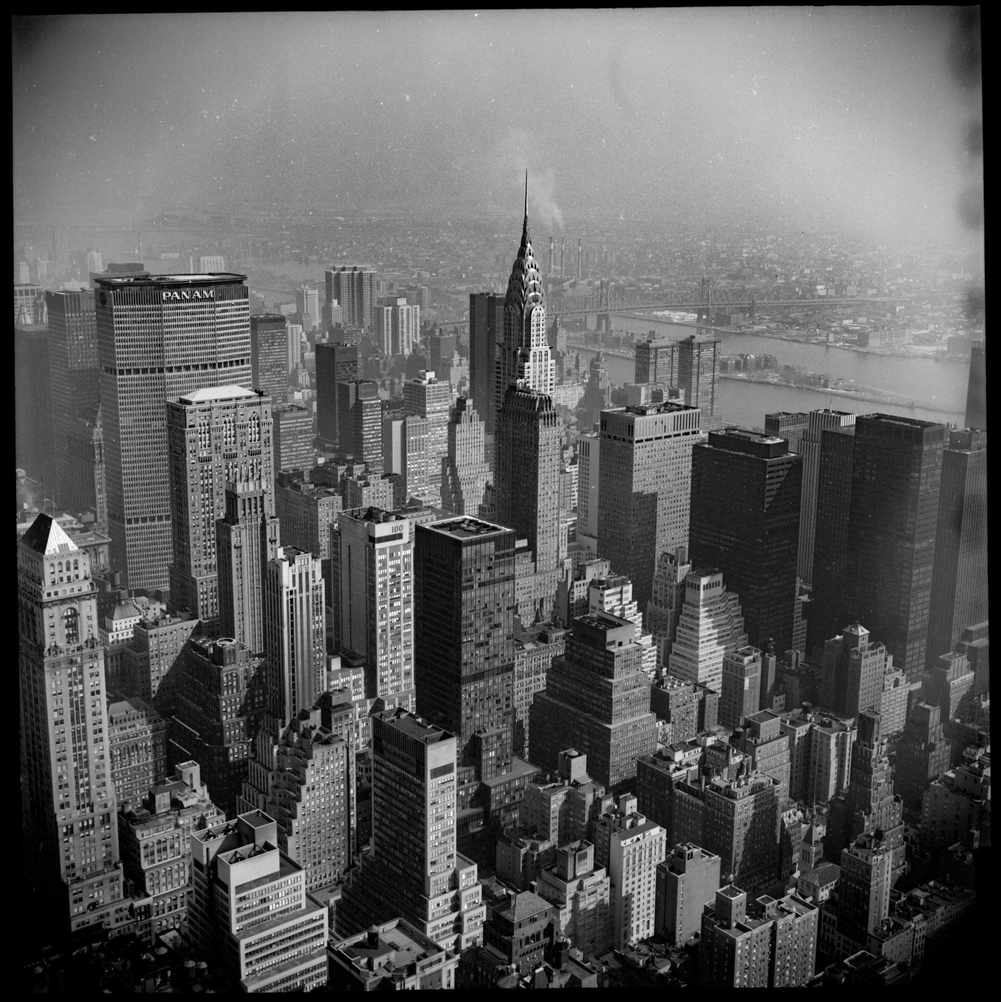 Looking Northeast towards the Chrysler Building, Queensborough Bridge over Roosevelt Island and Astoria.