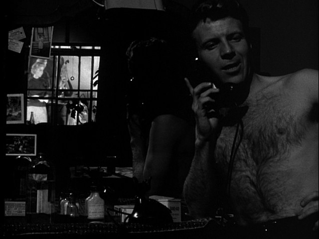 Killer's Kiss (1955) dir. Stanley Kubrick
Davey Gordon (Jamie Smith) watching Gloria Price (Irene Kane) through his apartment window, who can be seen from the reflection in the mirror behind Davey. One of the more impressive shots from the film.