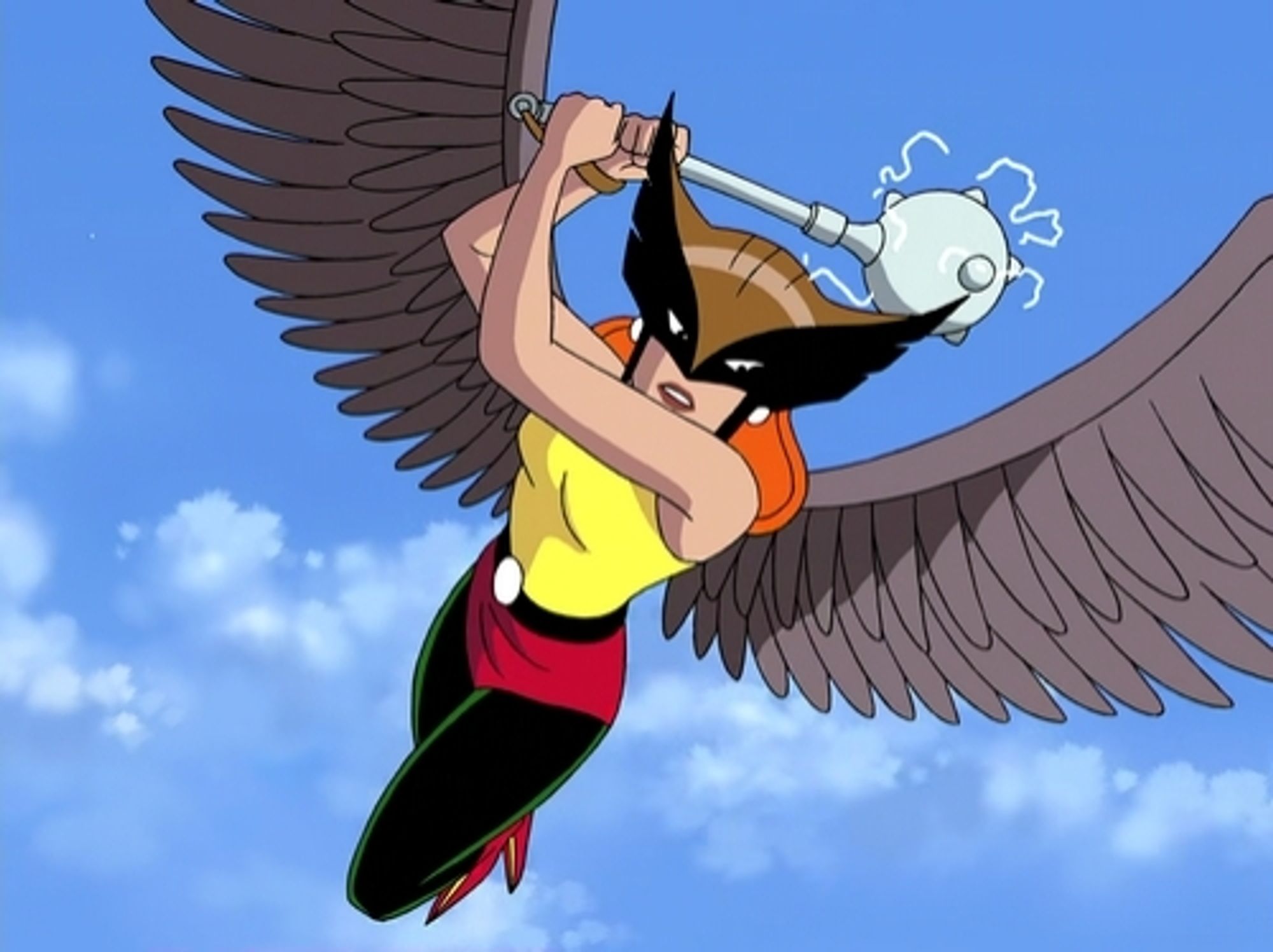 Image of superhero Hawkgirl from an animated Justice League cartoon. The character is a red haired woman with a birds shaped mask, holding an electrified mace, and has two large bird wings.