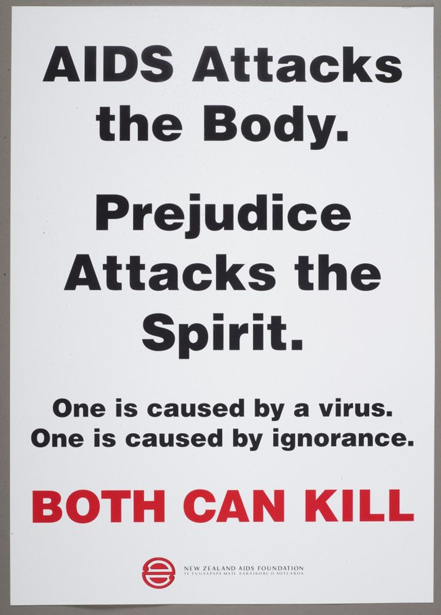 Poster: AIDS attacks the body. Prejudice attacks the spirit.
One is caused by a virus. One is caused by ignorance. BOTH CAN KILL