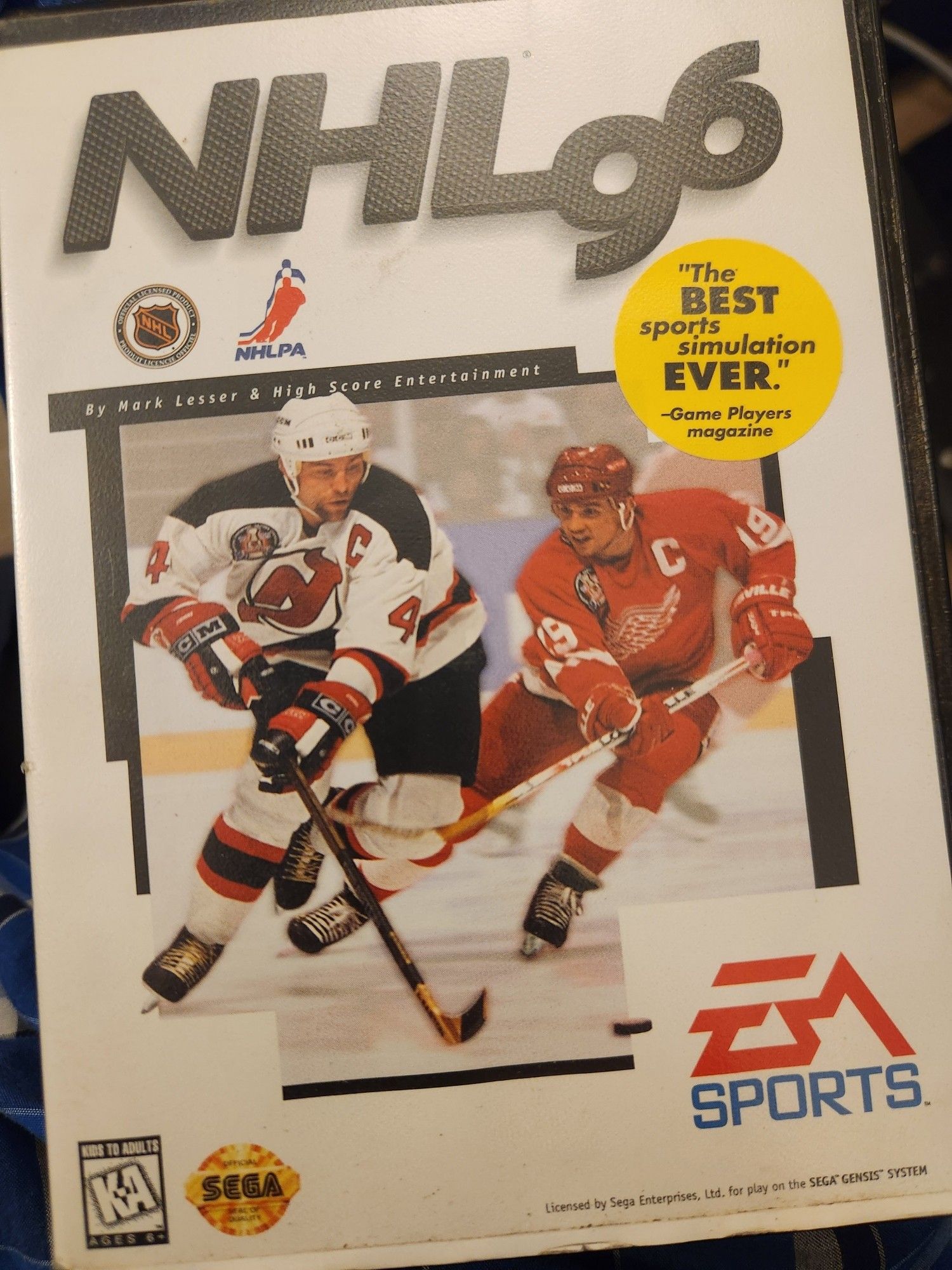 A complete copy of NHL96 for the Sega Genesis. It has a sticker proclaiming it to be "the BEST sports simulation EVER".