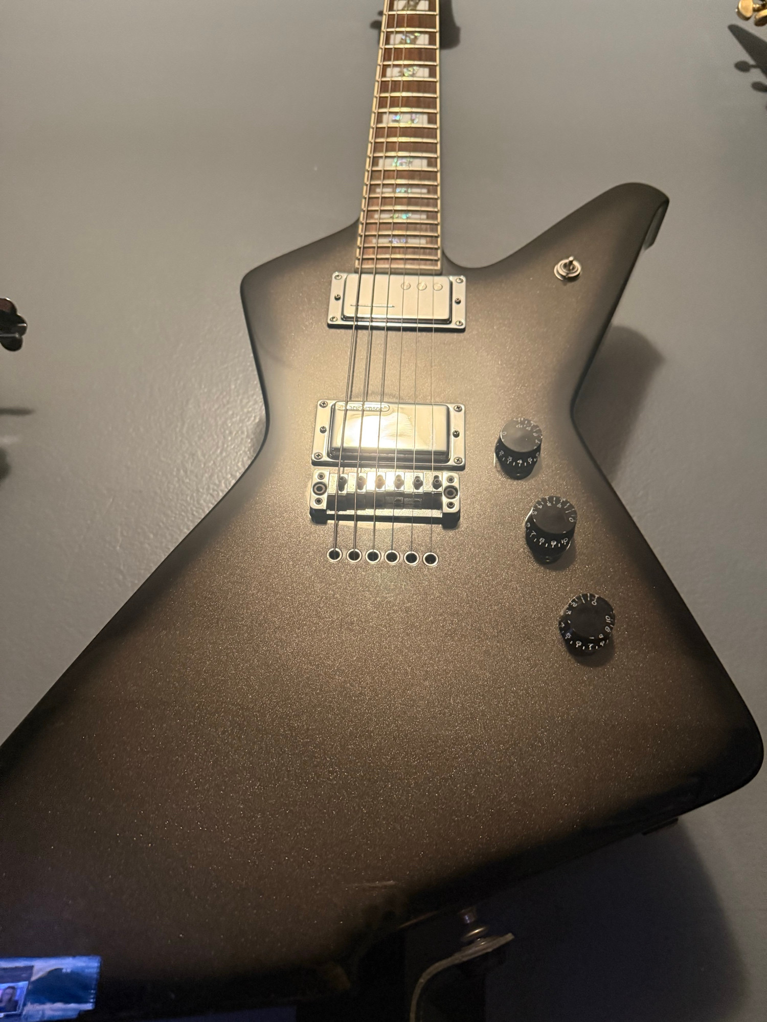 Ibanez destroyer guitar with a silver burst finish. 