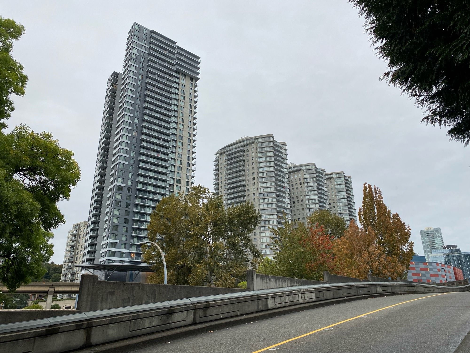 A row of towers as seen from an overpass