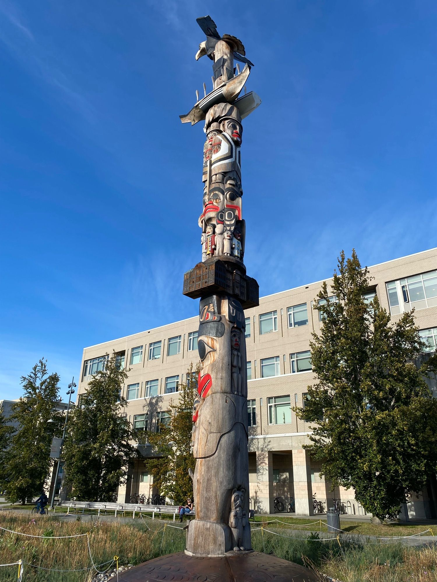 55-foot red cedar pole designed and carved under the direction of master carver 7idansuu (Edenshaw), James Hart (hereditary chief, Haida Gwaii)