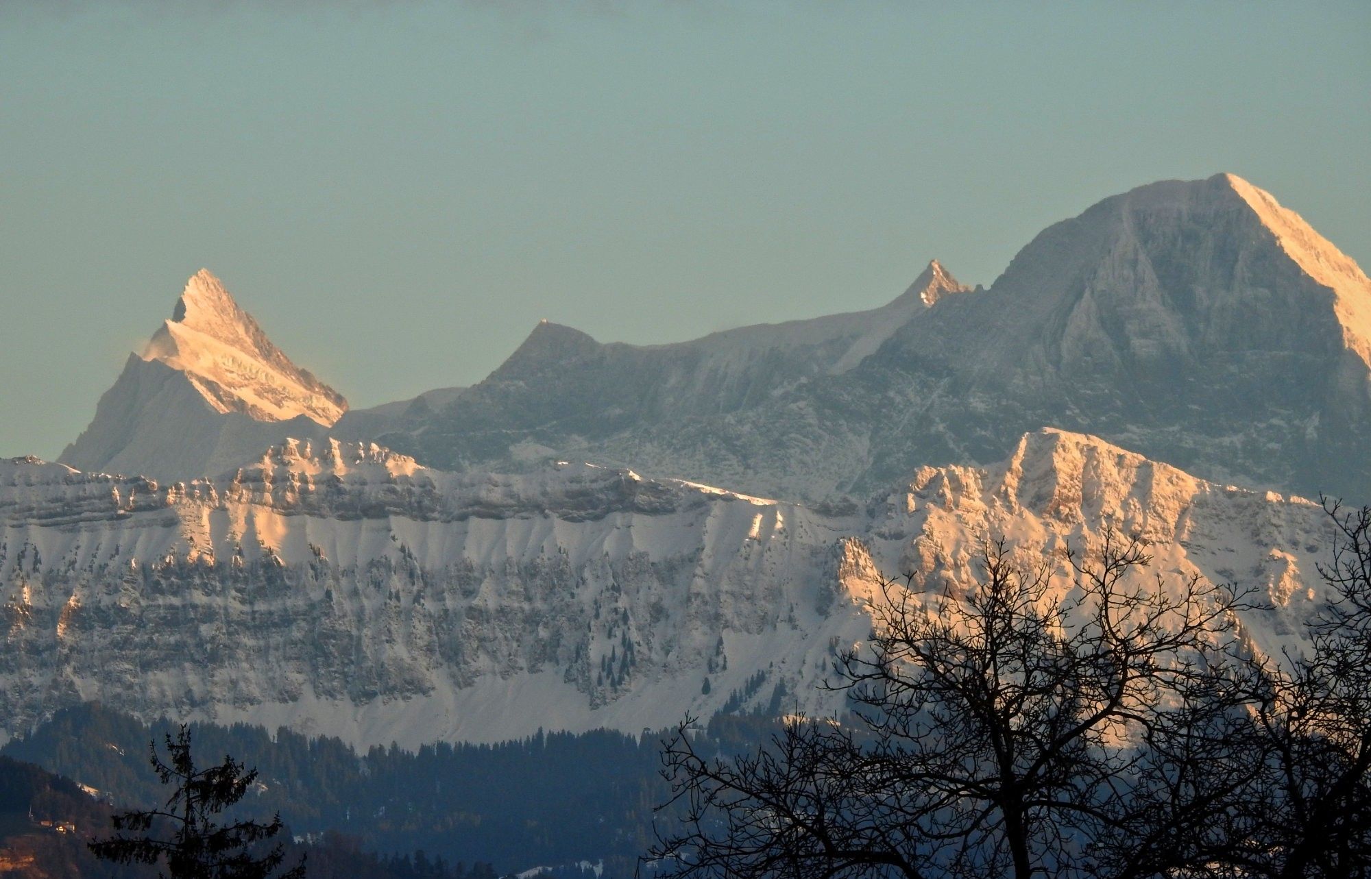 Snowy mountains as the sun goes down