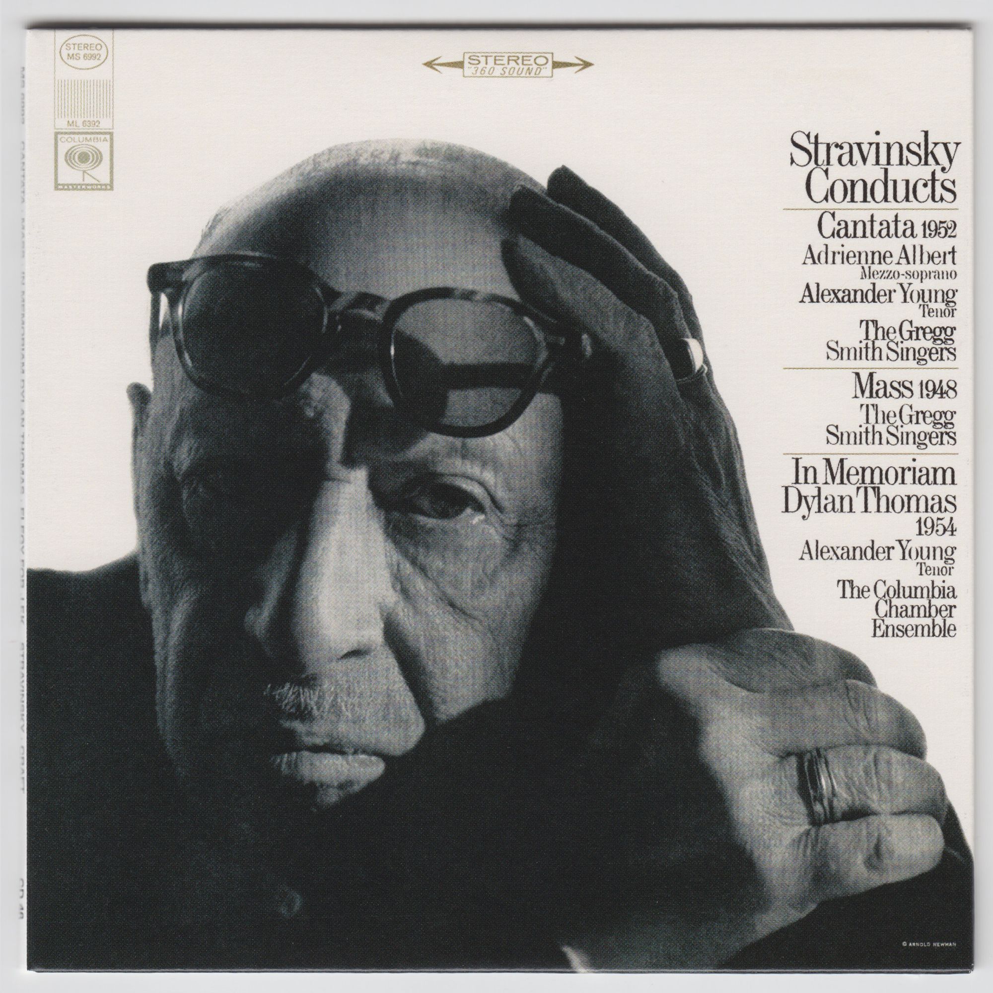 Stravinsky raising his glasses and peering at you with a look of weary suspicion