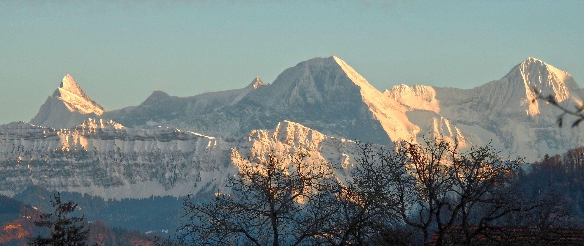 Snowy mountains as the sun goes down