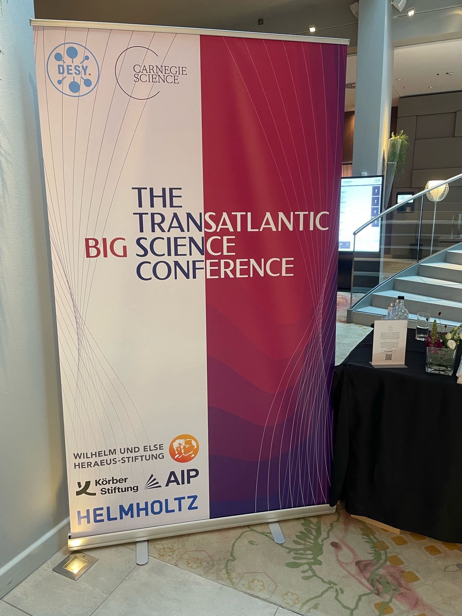 Standing poster with the Transatlantic Big Science Conference ident