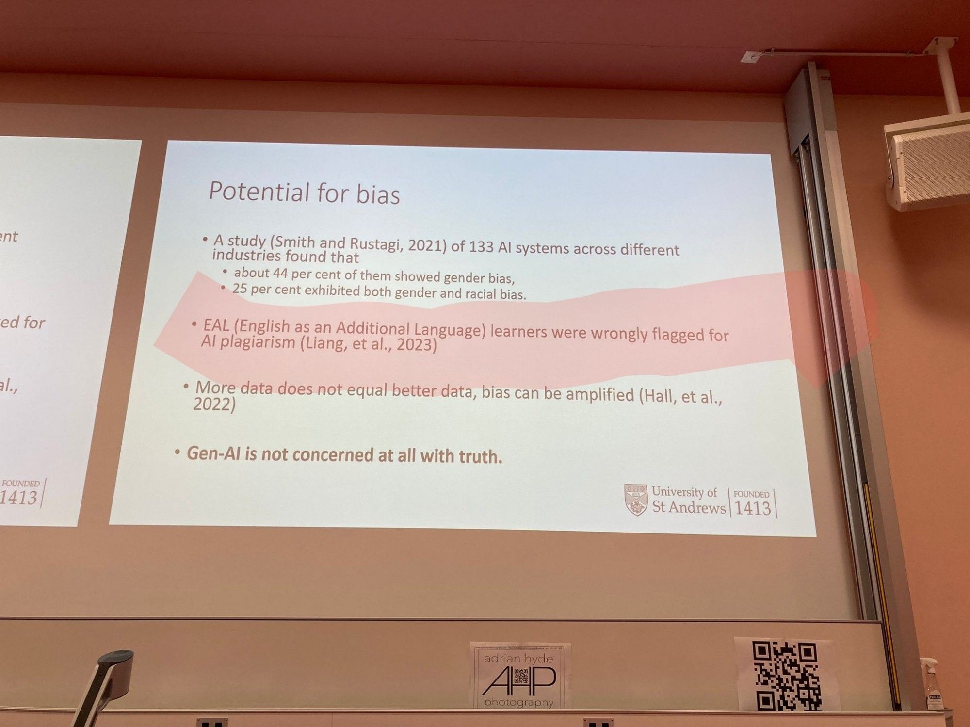 Phone photo from a TESOL conference of a projected PowerPoint slide, entitled Potential for Bias & having 4 bullet points as follows:
- A study (Smith & Rustagi, 2021) of 133 AI systems across different industries found that: about 44% found gender bias; 25% exhibited both gender & racial bias. 
- EAL (English as an additional language) learners were wrongly flagged for AI plagiarism (Liang et al 2023). [THIS IS THE STUDY I REFER TO IN THE SKEET]
- More data does not equal better data, biases can be amplified (Hall et al 2022.
-Gen-AI is not concerned at all with truth
------------
Have a good one😊💜