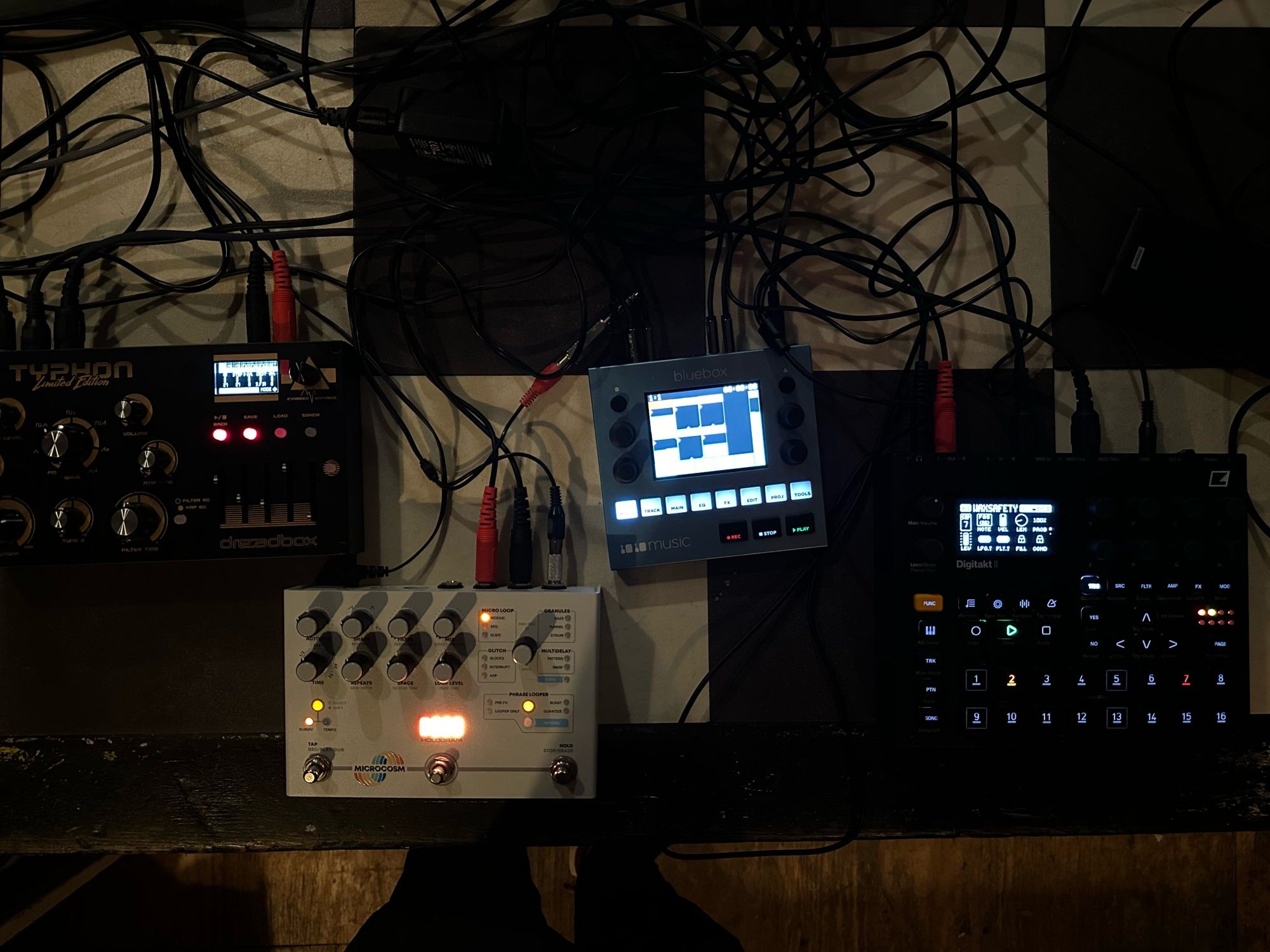 Dreadbox Typhon, Hologram Microcosm, 1010 Bluebox, and Elektron Digitakt II on a table set up for a jam session.