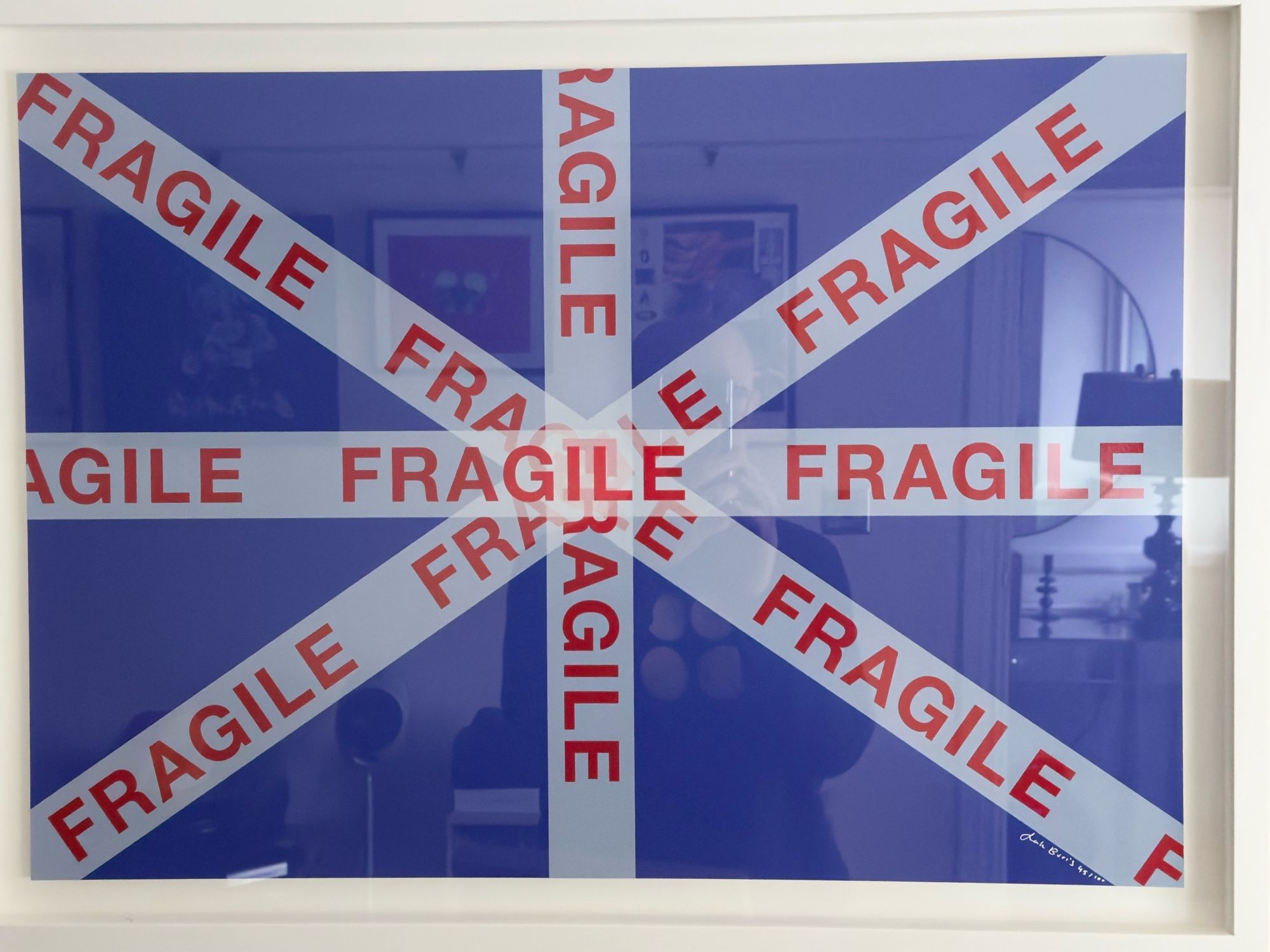 A Union Jack flag that incorporates ’fragile’ parcel tape