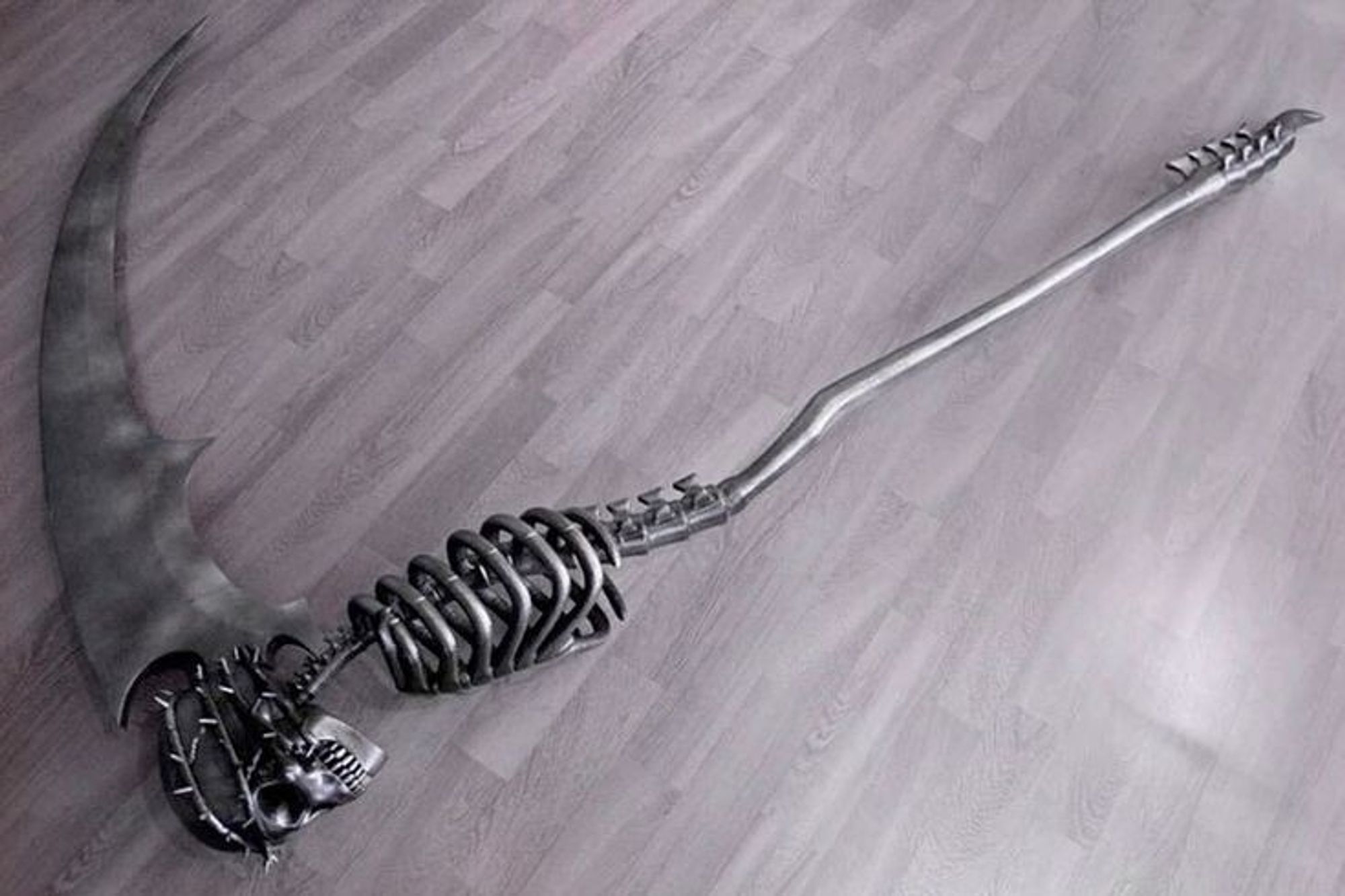 scythe shaped like a skeleton