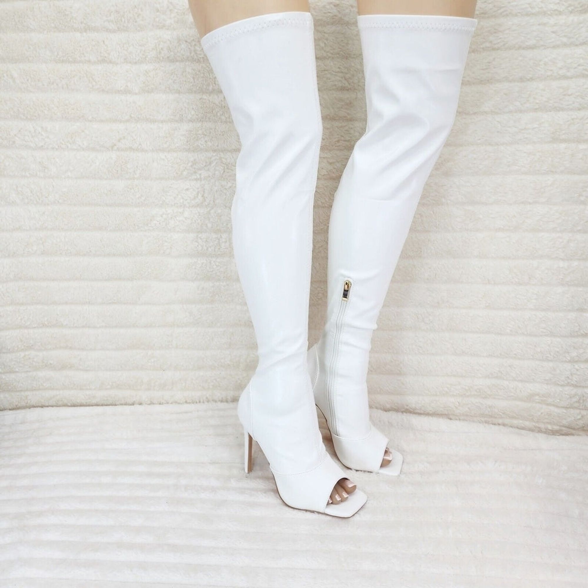 White thigh high boots