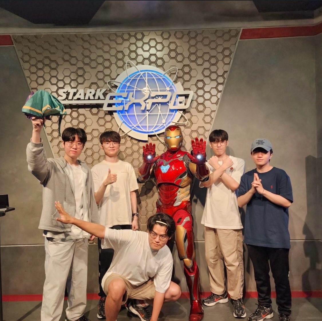 t1 family photo with iron man at disney land hong kong