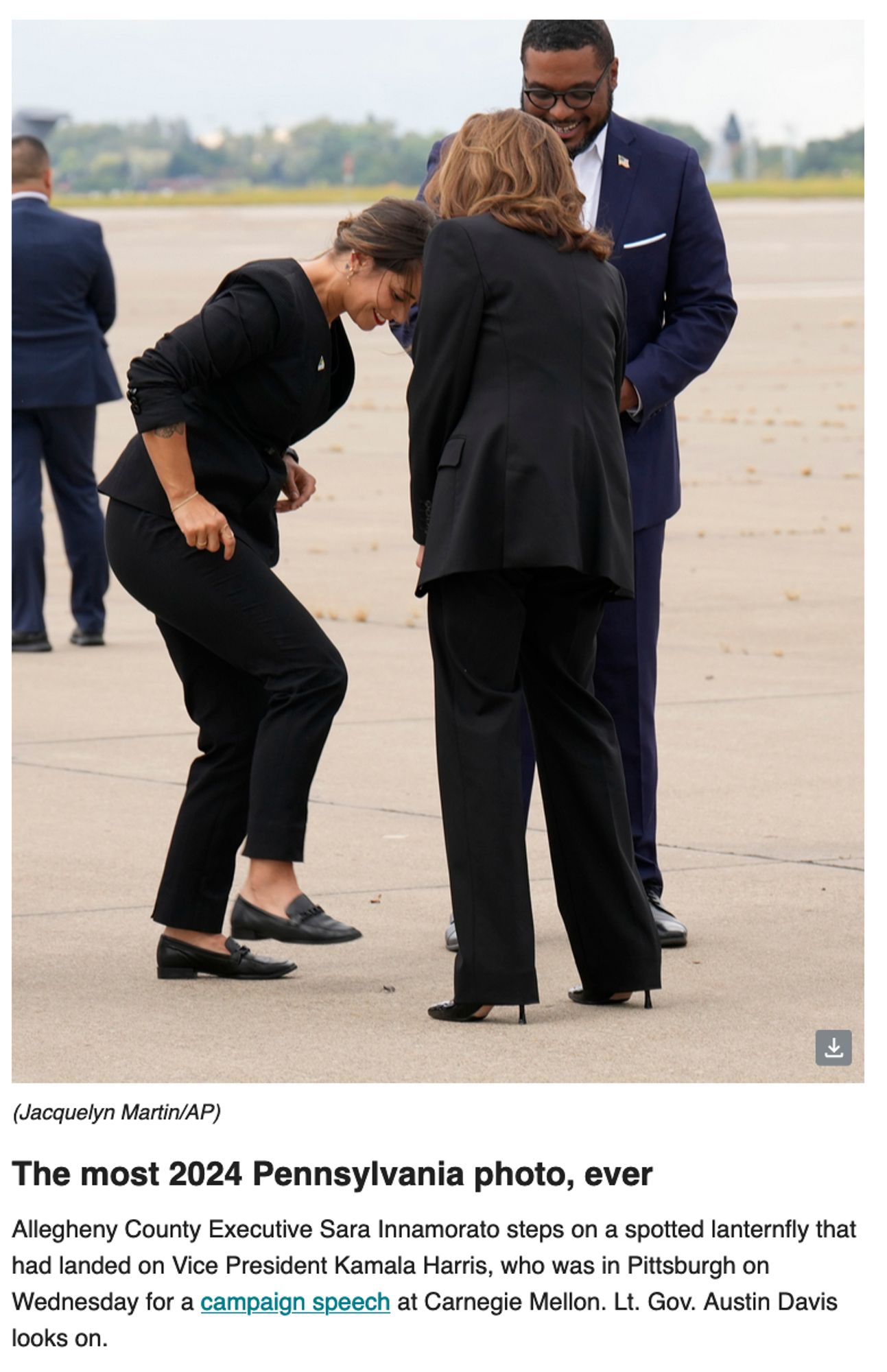 Allegheny County Executive Sara Innamorato steps on a spotted lanternfly that had landed on Vice President Kamala Harris