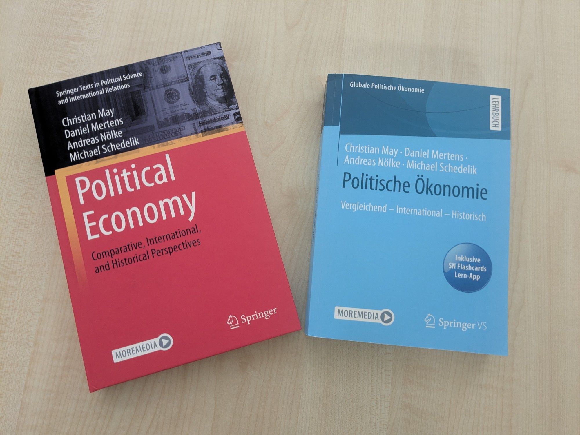 Images of the books on political economy by May et al.