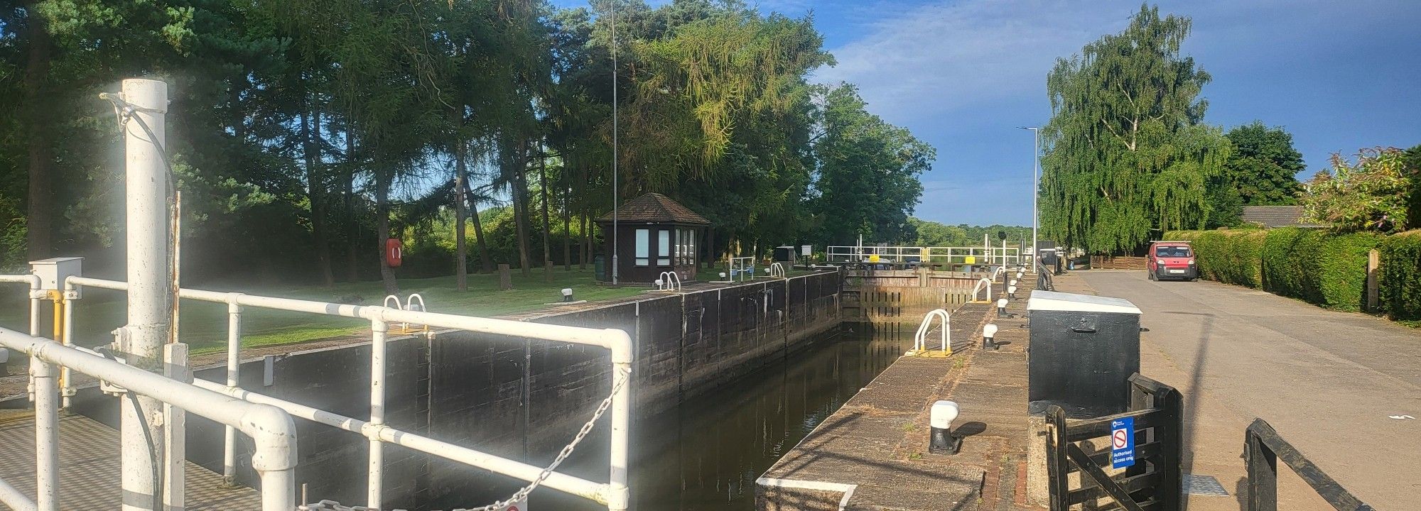 Gunthorpe lock on the river trent standing empty in bright morning sun waiting for the first boat of the day.