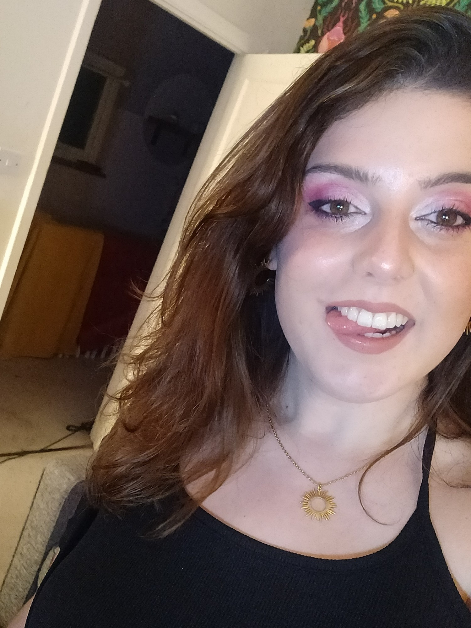 woaaaaa it's me again, wearing a black top and a sun necklace. i used to do this pink eyeshadow look so much but kinda fell into more neutral tones  recently which is a shame!!! but anyway I still remember how to do it yippee. sticking my tongue out again, what's new, anyone wanna suck on it