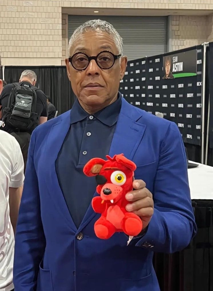 idk a picture of that guy who played gus fring holding a foxy plush it made me laugh