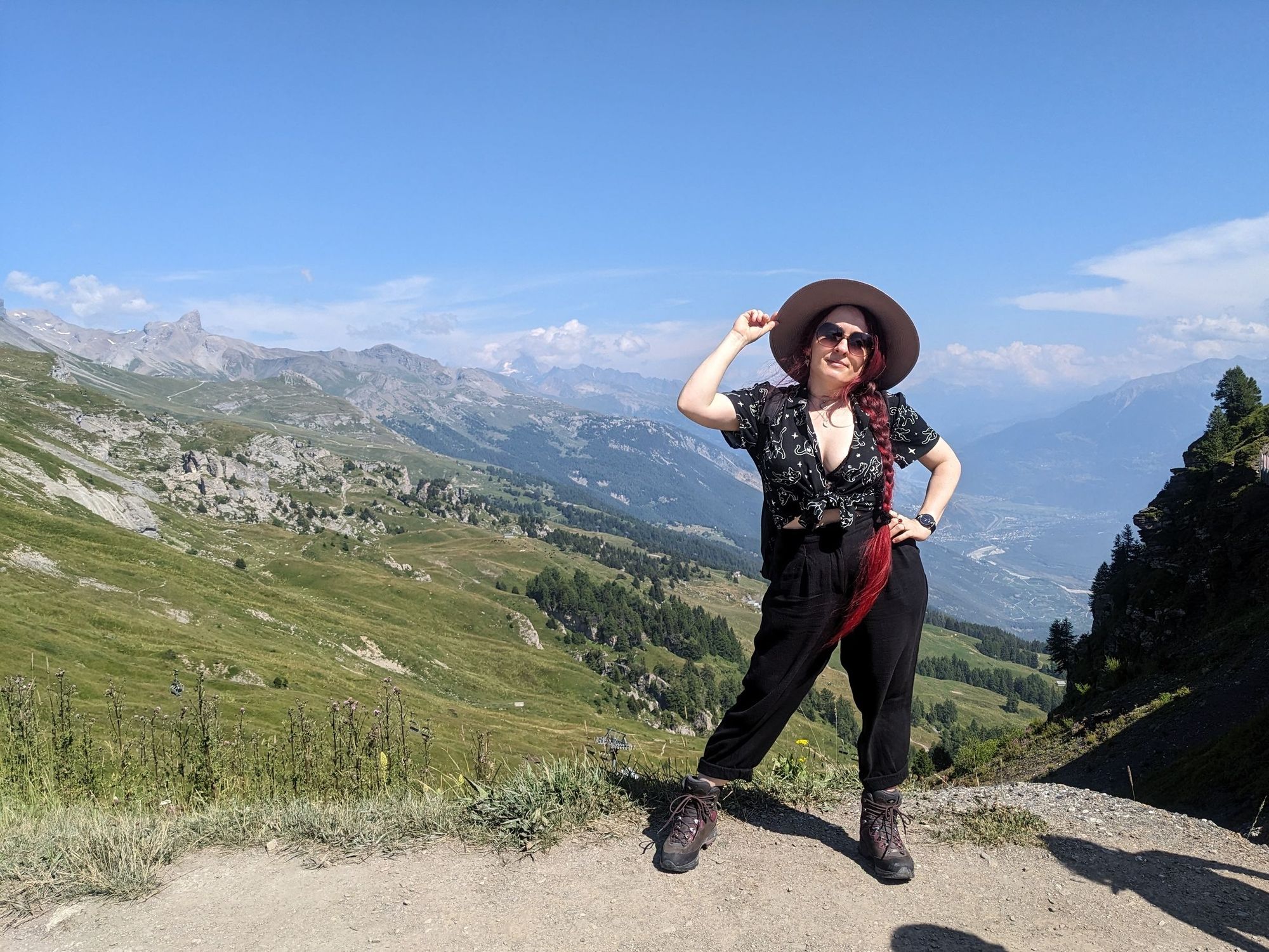 Photo of me standing on some picturesque swiss mountains.