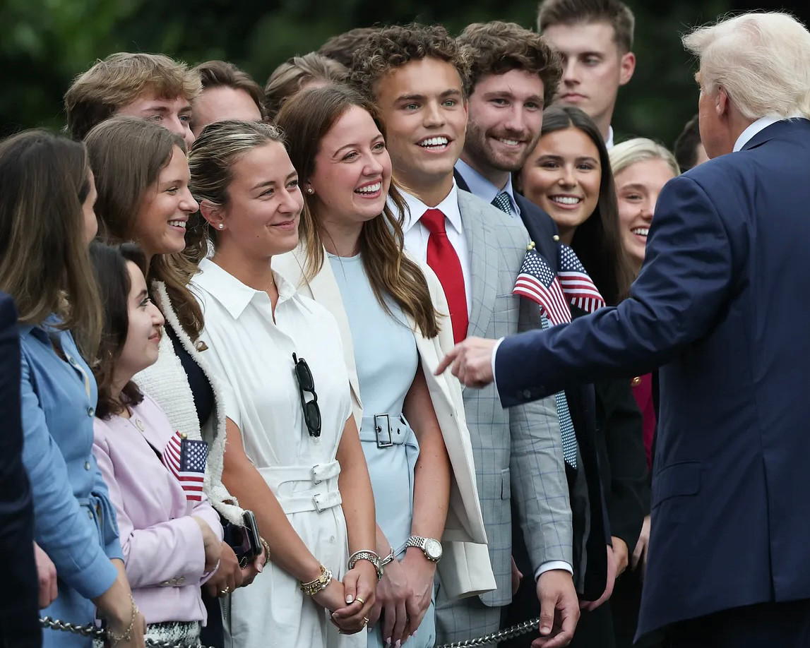 Trump with supporters as he leaves the White House 08/04/25. (Win McNamee/Getty)