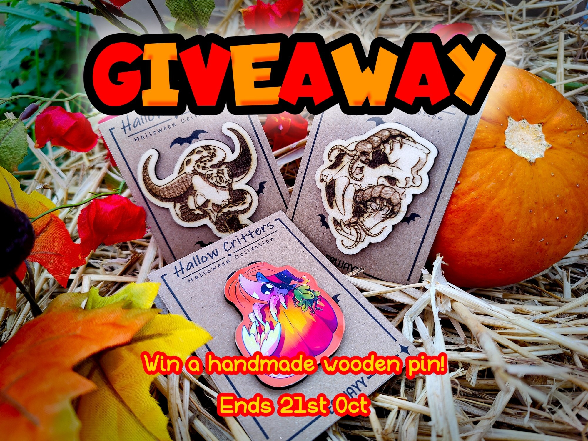 Promotional image of three wooden pins (an ox skull with a rattlesnake, a saber car skull with a centipede, and a shrimp in a pumpkin) with big red and orange words "GIVEAWAY" followed by smaller text reading "Win a handmade wooden pin! Ends 21st Oct."
The items are on hay surrounded by autumn leaves and a pumpkin.