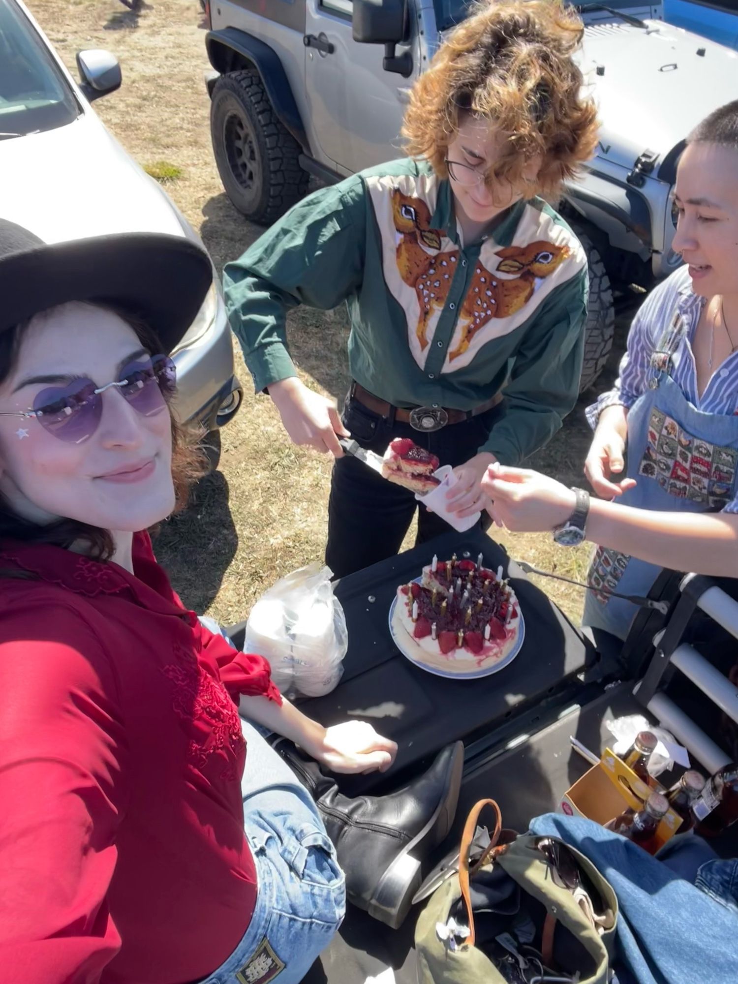 selfie of me with some friends and the cake they made me