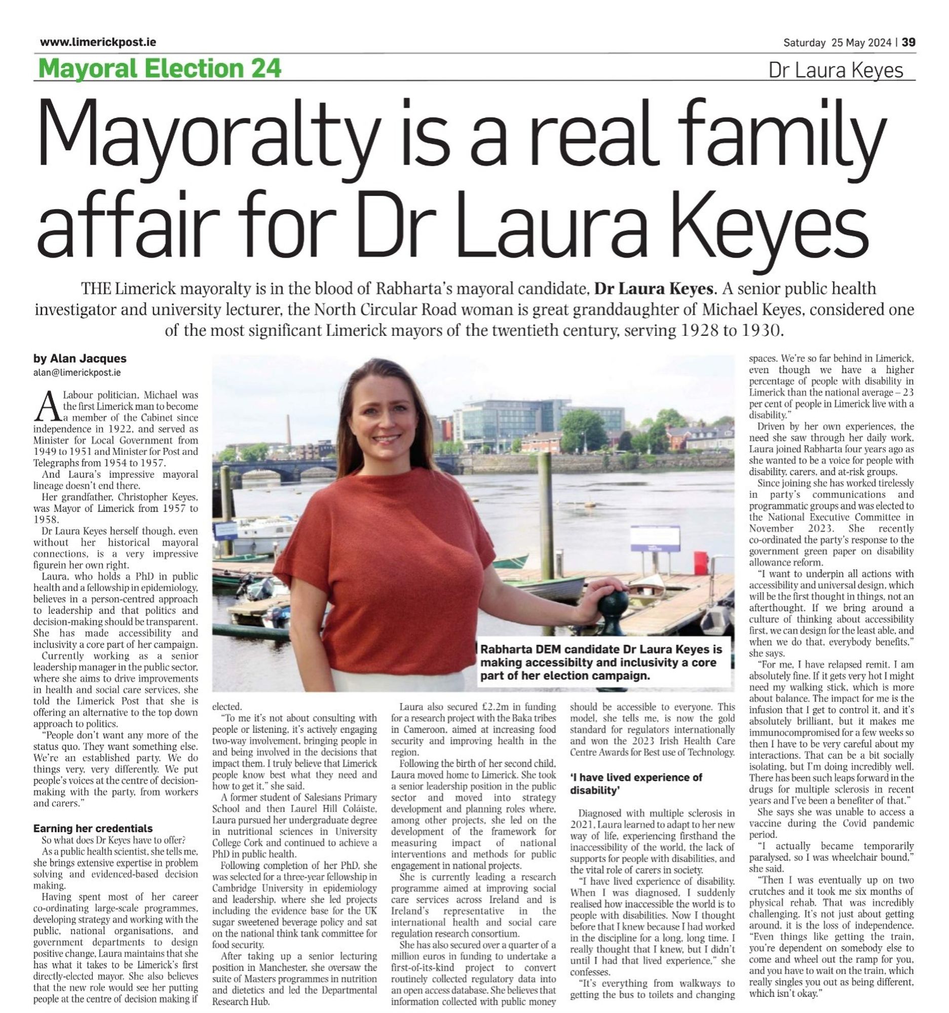 A picture of a newspaper article about Laura Keyes. The headline is, Mayoralty is a real family affair for Dr Laura Keyes. There is a full page of text detailing an interview with her. There is also a picture of Laura standing by the Shannon River at the centre of the page.