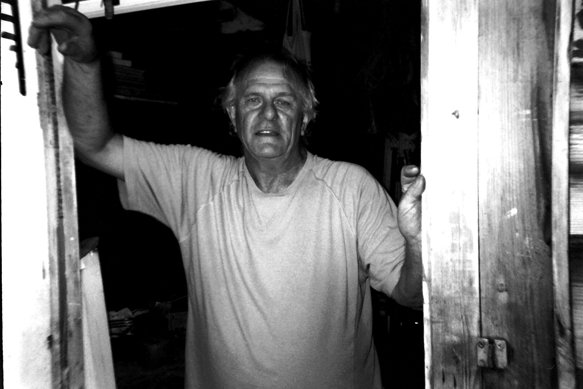 A relative of mine pontificating about something in the doorway of his shed.