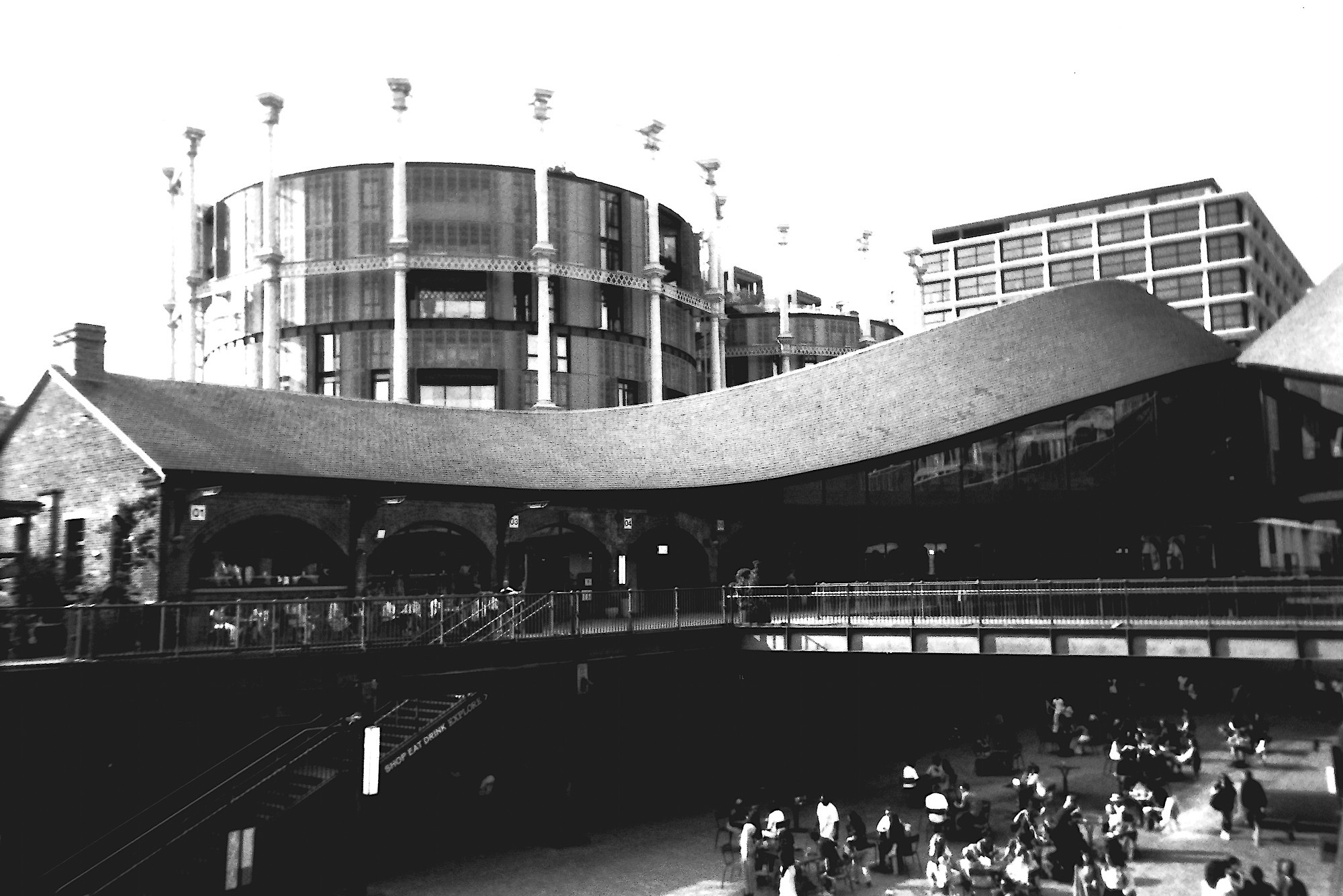 Part of Coal Drop Yards, Kings Cross, London. With an apartment block built within the skeleton of a Victorian gas holder.