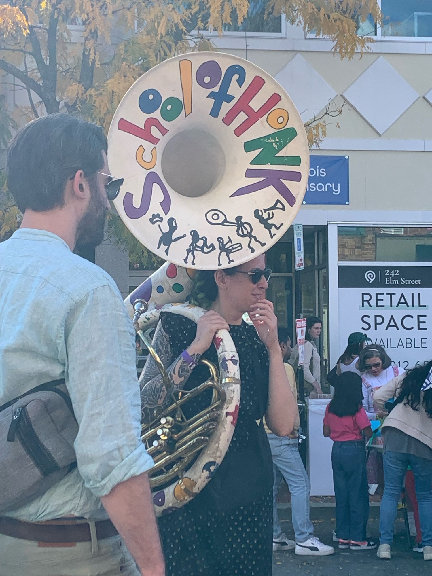 school of honk tuba player in the crowd