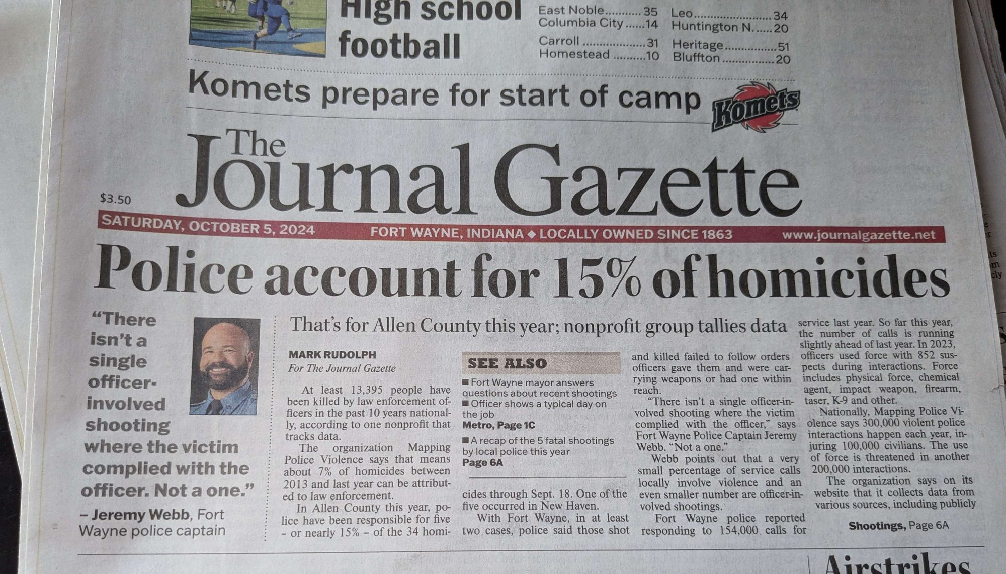 Today's Fort Wayne Journal Gazette newspaper at the gas station. The headline reads Police account for 15% of homicides. That's for Allen county this year, nonprofit group tallies data. With a pull quote from FWPD info cop Jeremy Webb & his stupid smiling face reading there isn't a single officer involved shooting where the victim complied with the officer