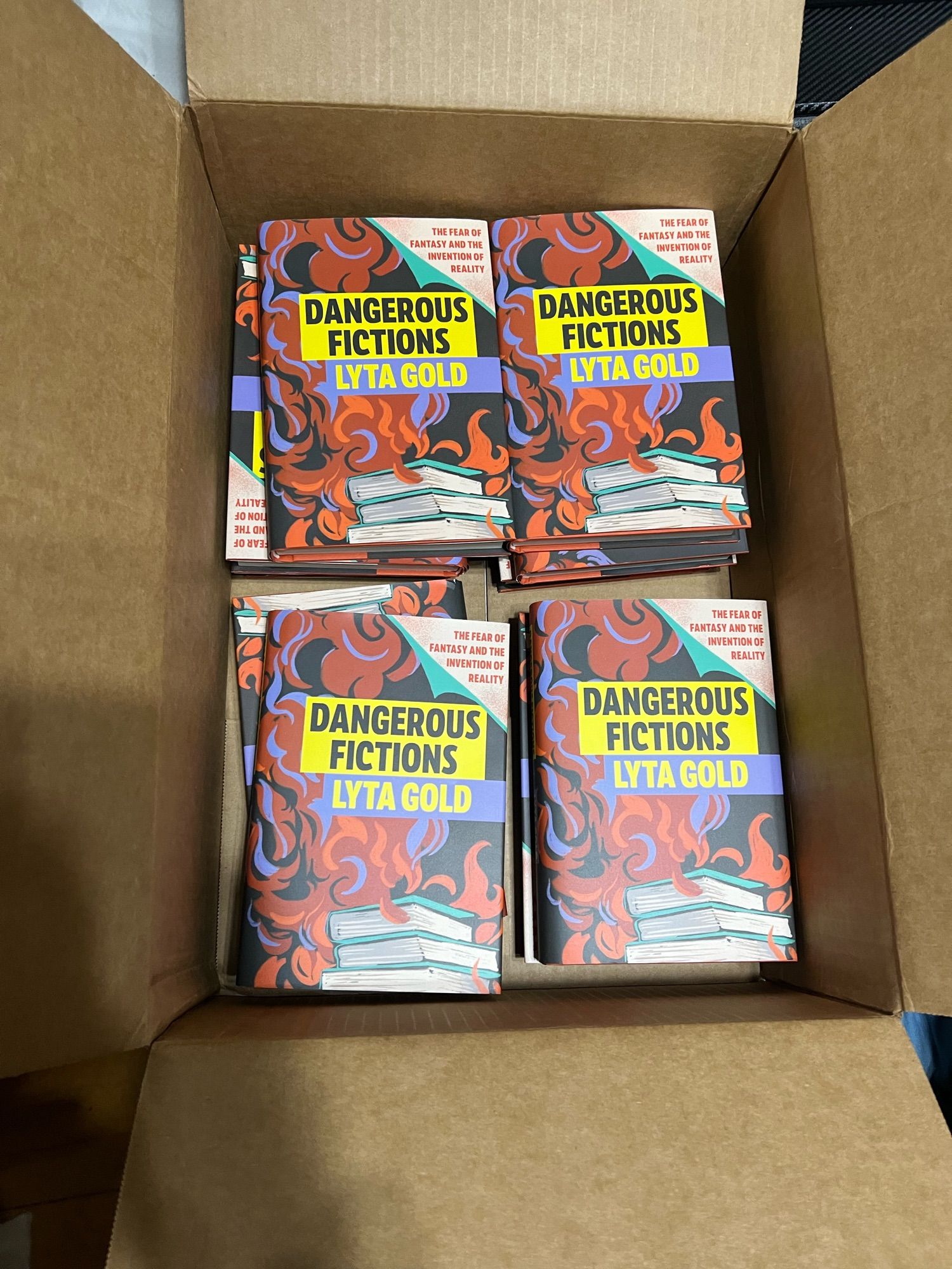 10 copies of my book, DANGEROUS FICTIONS, newly arrived from the distributor